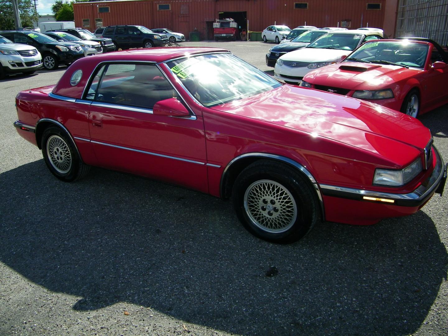 1991 Red /Beige Chrysler TC By Maserati Convertible (ZC2FS1207MB) with an 3.0L V6 SOHC 12V engine, 4-Speed Automatic Overdrive transmission, located at 4000 Bee Ridge Road, Sarasota, FL, 34233, (941) 926-0300, 27.298664, -82.489151 - Photo#6